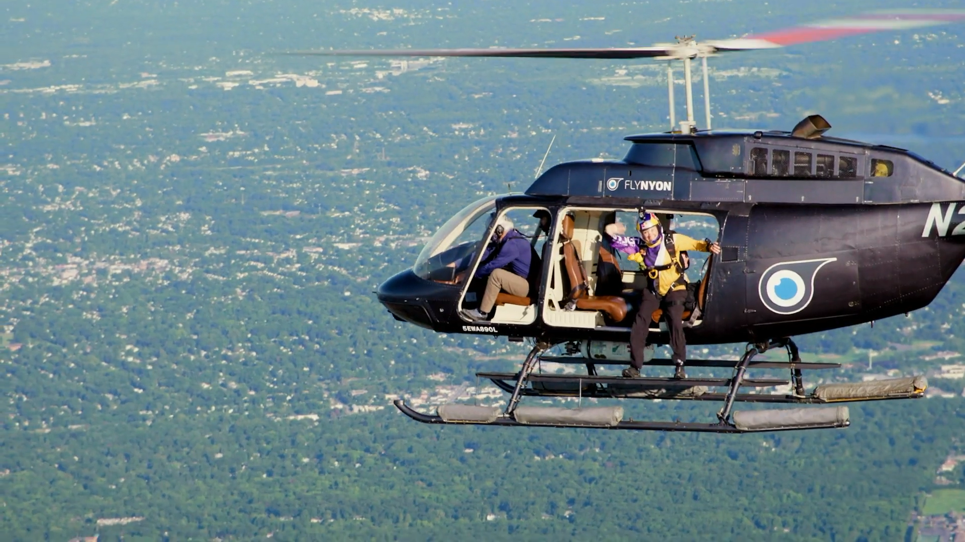 The Bronx: Live Coverage Recap: Highlight Pro Skydive Team Jumps into Woodlawn Cemetery Social