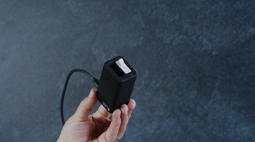 Showing how to use the GoPro dual battery charger for max and the enduro battery hand model with USB-C cable connected to charger