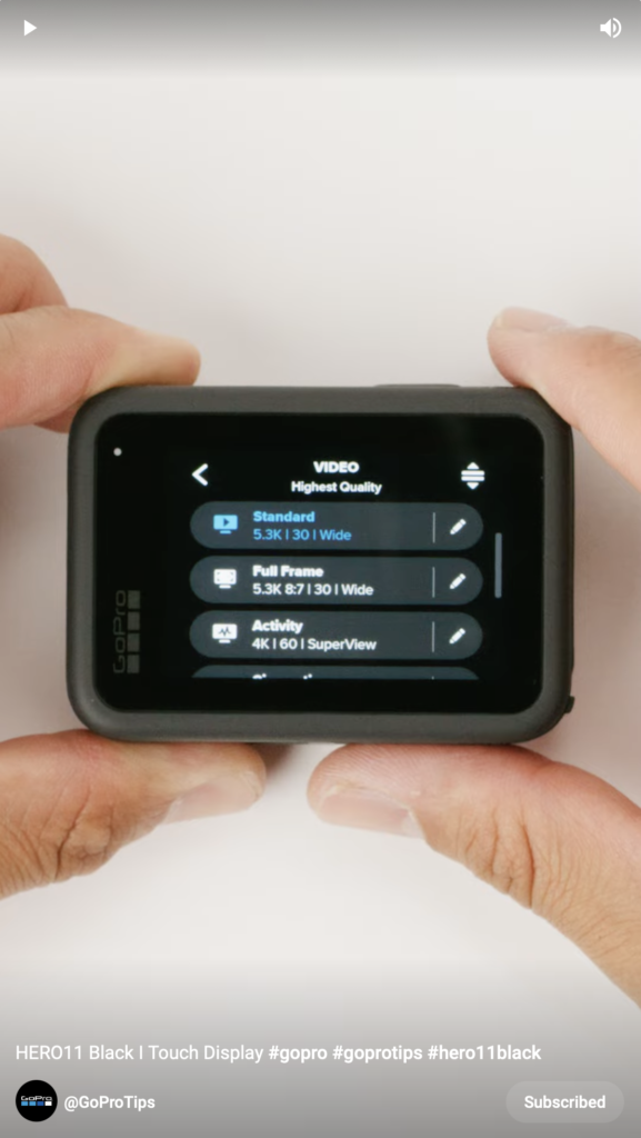 hand model shows the GoPro Hero 11 touch display and how to change preset resolution and frame rate