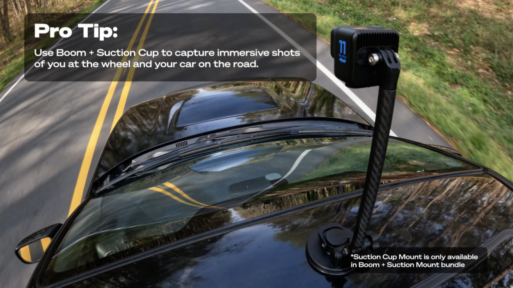 GoPro Hero11 Mini Hero 11 Mini mounted to the GoPro Boom Suction Mount Suction cup mount on a black car driving on a country road Pro Tip: Use Boom + Suction Cup to capture immersive shots of you at the wheel and your car on the road.