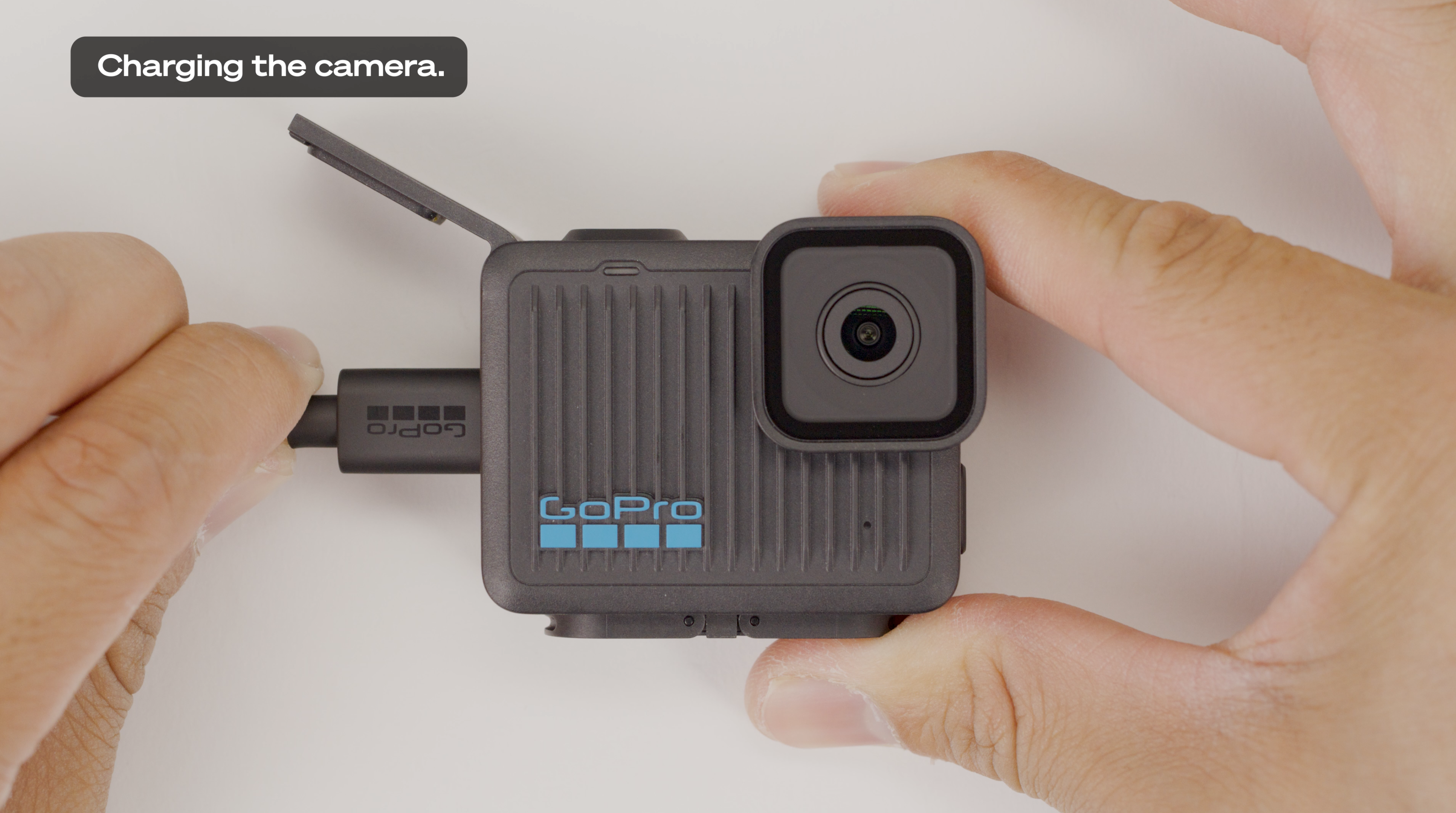 charging the camera. Showing how to charge your GoPro HERO camera with USB-C cable plugged into the side port