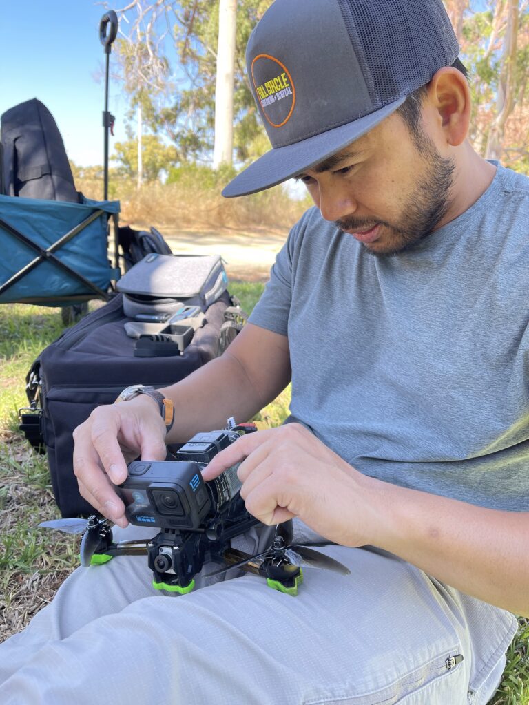 Jason dialing in the setting for its next drone flight.