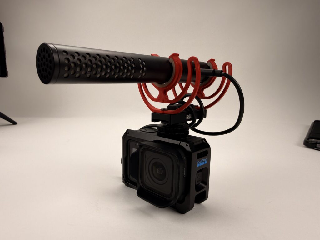Behind the scenes shooting the GoPro Mission 1 pro in the Full Circle Streaming and Digital Studio. A white wall video tutorial